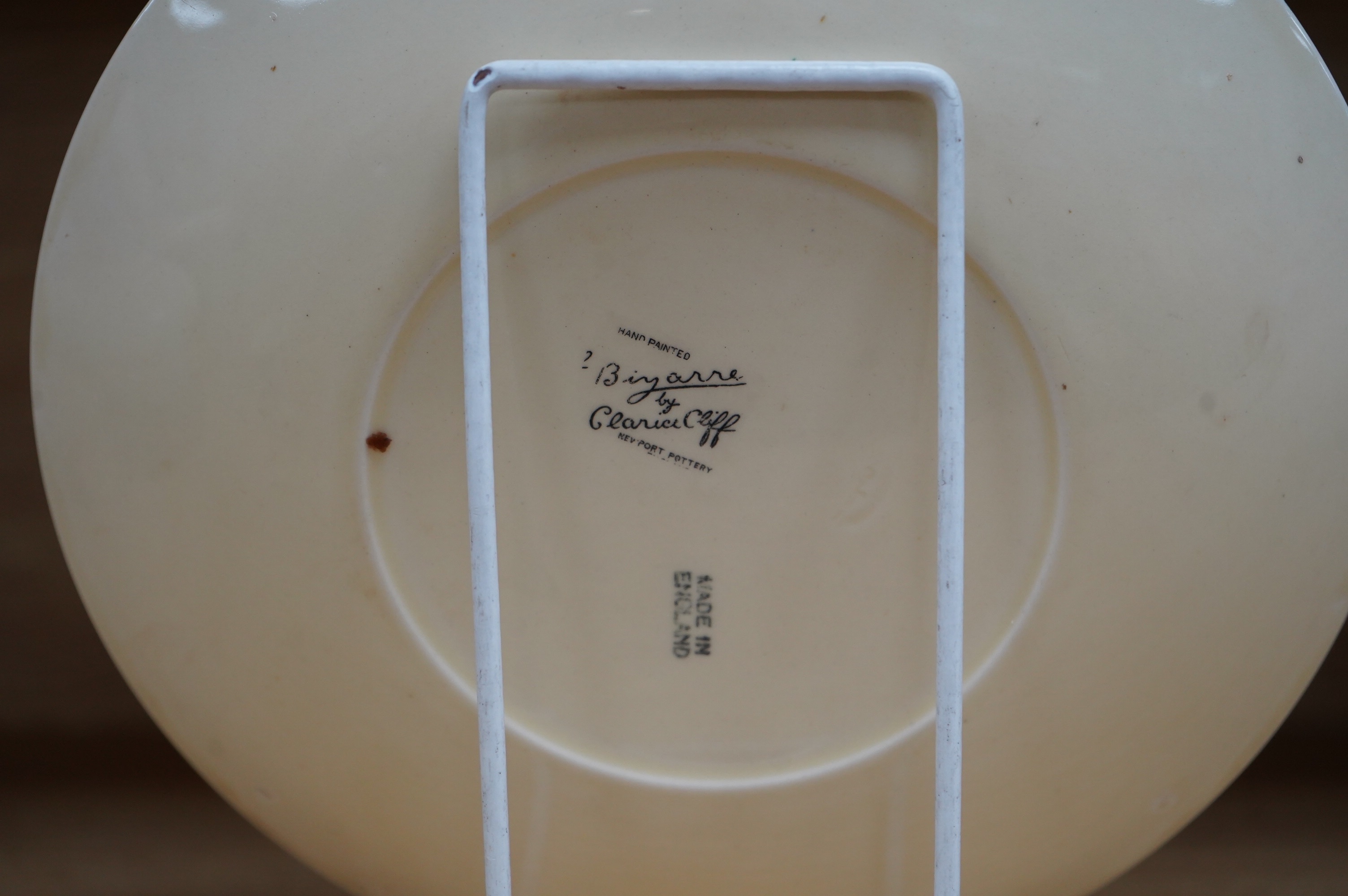 A Clarice Cliff Bizarre Sungay plate, 23cm diameter. Condition - light wear